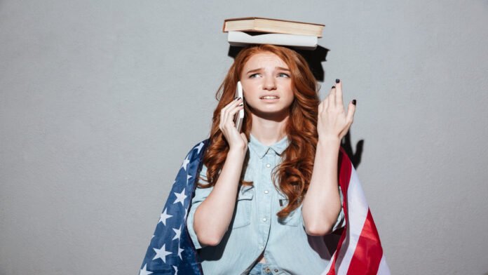 Confused redhead young lady holding book on head The 15% Cap: How Trump's New Policy Could Reshape the American Dream for Indian Students
